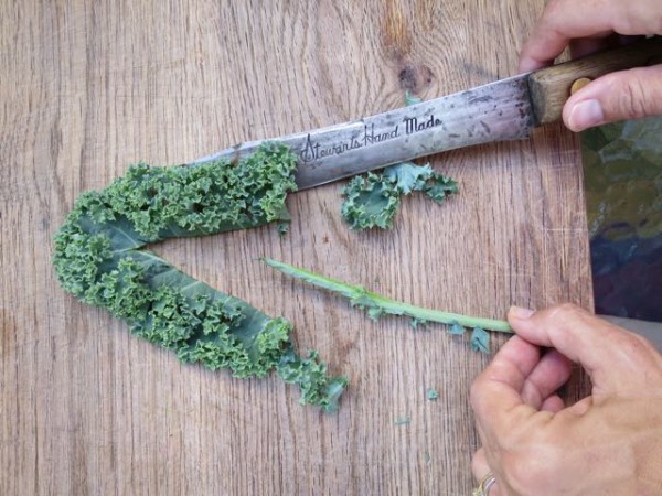 When making kale chips, make sure to debone the kale by cutting out the woody stem