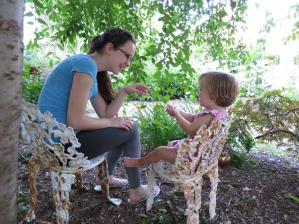 Sofia and Diana on the baby antique chairs under our weeping cherry tree.