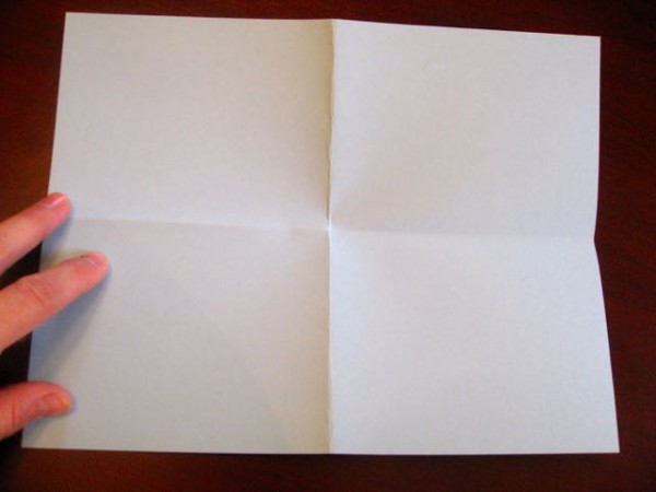 To make a small but hefty card, fold regular printer paper into fourths